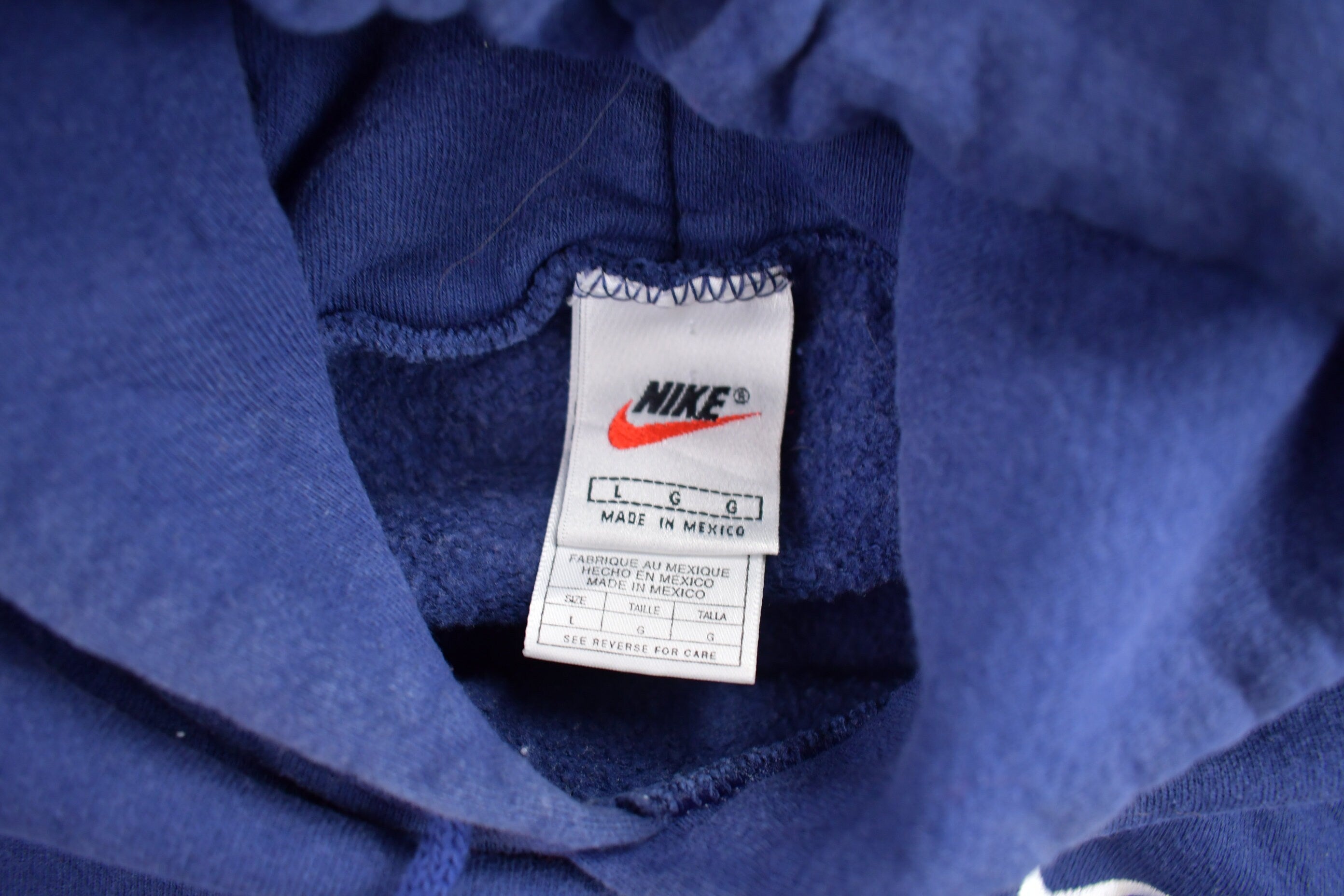 Vintage 1990s Nike Embroidered Mini Swoosh Blue Hoodie