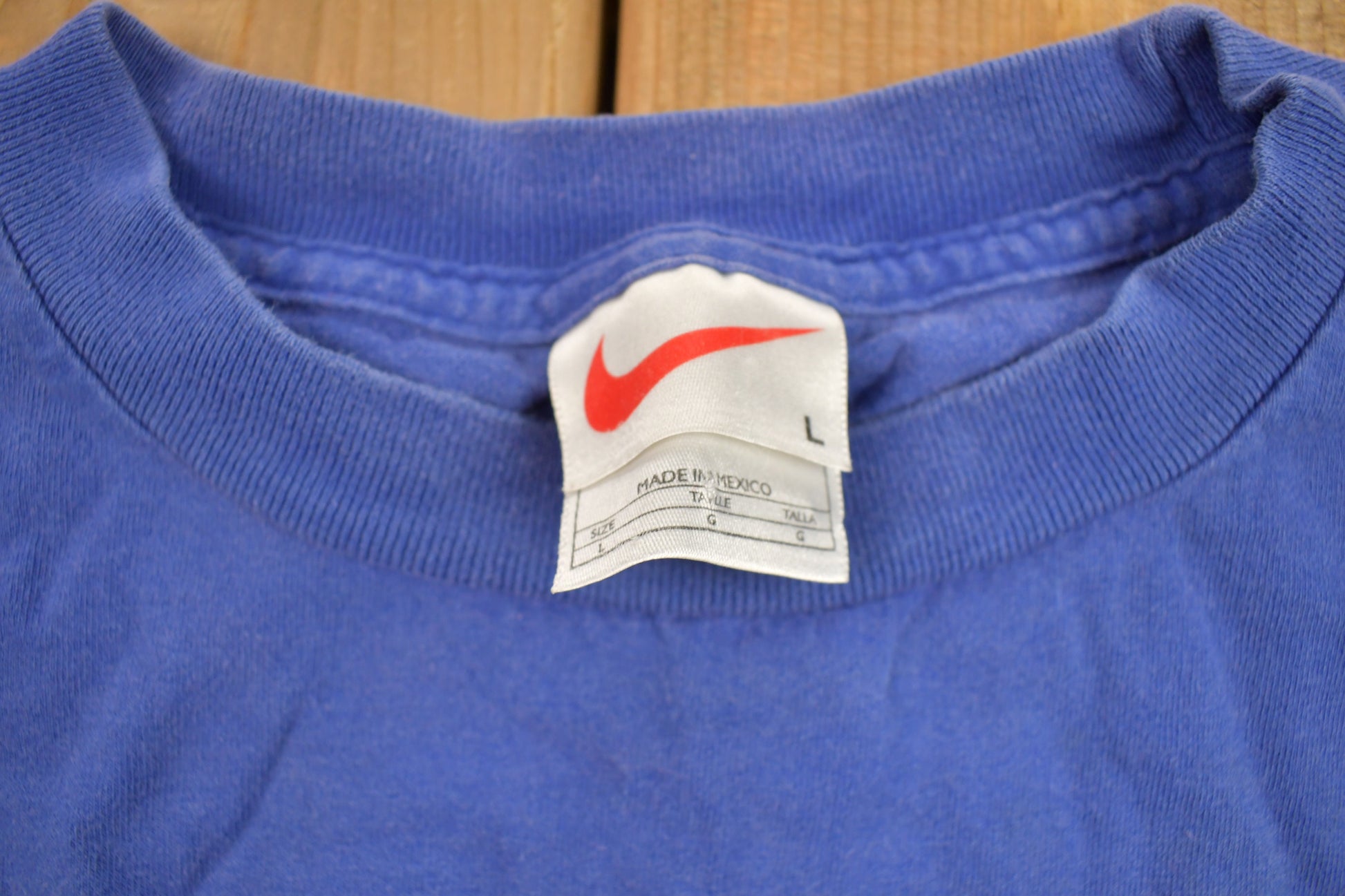 Vintage 1990s Nike Mini Swoosh Graphic T-Shirt