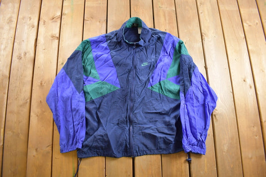 Vintage 1990s Nike Embroidered Windbreaker Jacket / Mini Swoosh / Spring Summer Sportswear / Color Block / Athleisure / 90s Nike