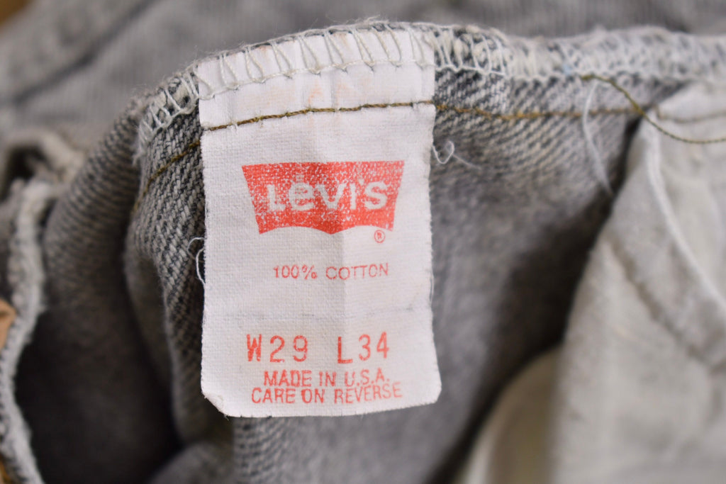 Vintage 1980s Levi's 505 Grey Light Wash Cut Offs