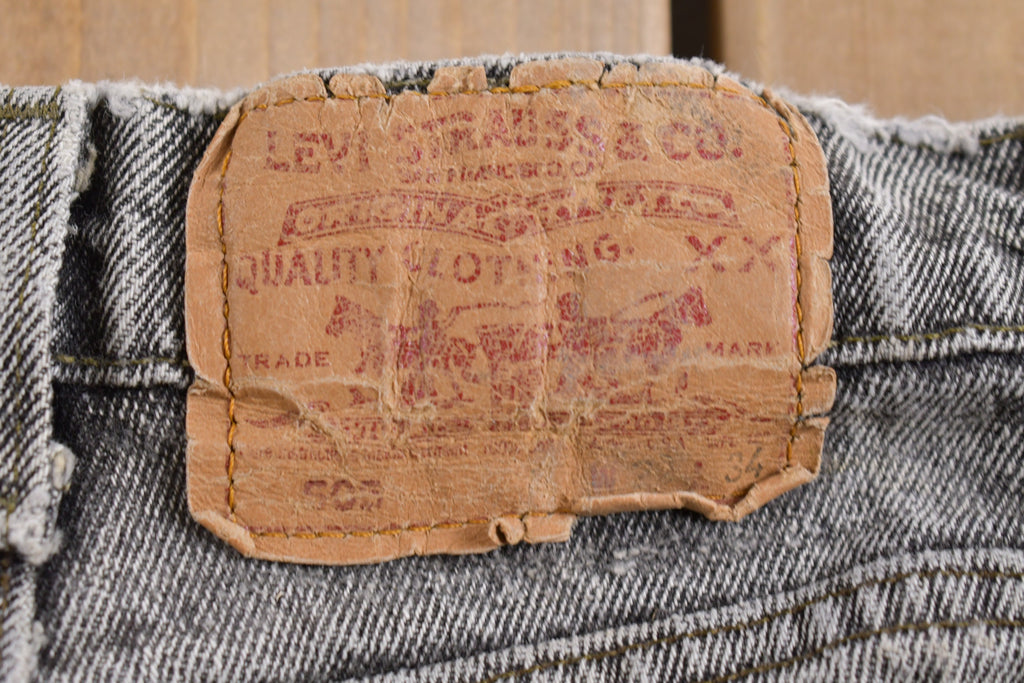 Vintage 1980s Levi's 505 Grey Light Wash Cut Offs