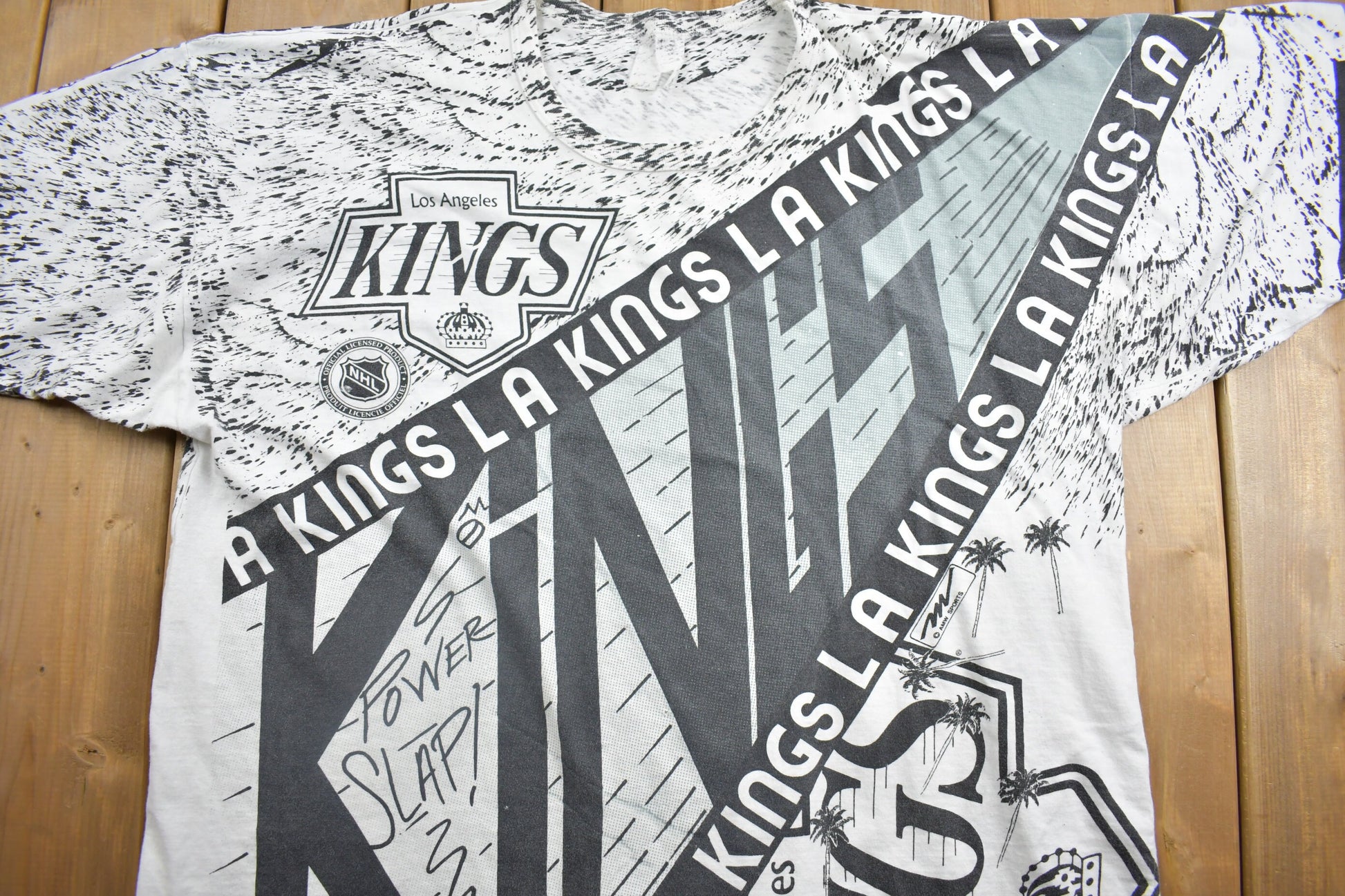 Vintage 1990s Los Angeles Kings NHL All Over Print Graphic T-Shirt