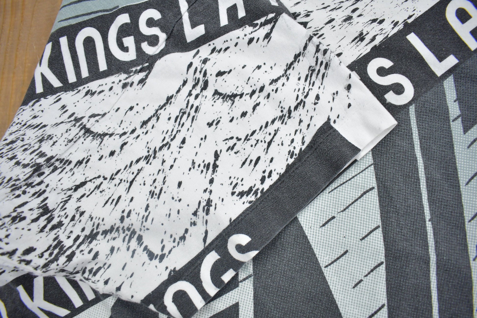 Vintage 1990s Los Angeles Kings NHL All Over Print Graphic T-Shirt