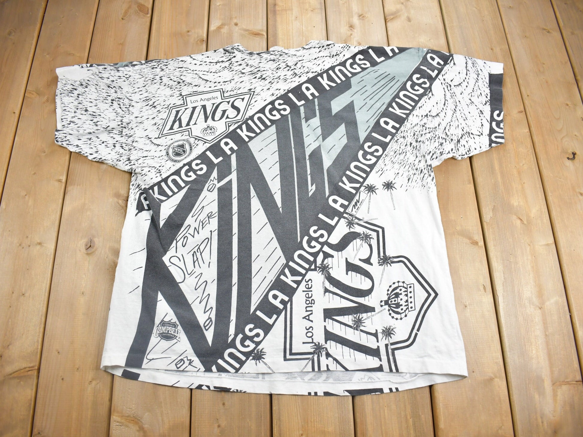 Vintage 1990s Los Angeles Kings NHL All Over Print Graphic T-Shirt
