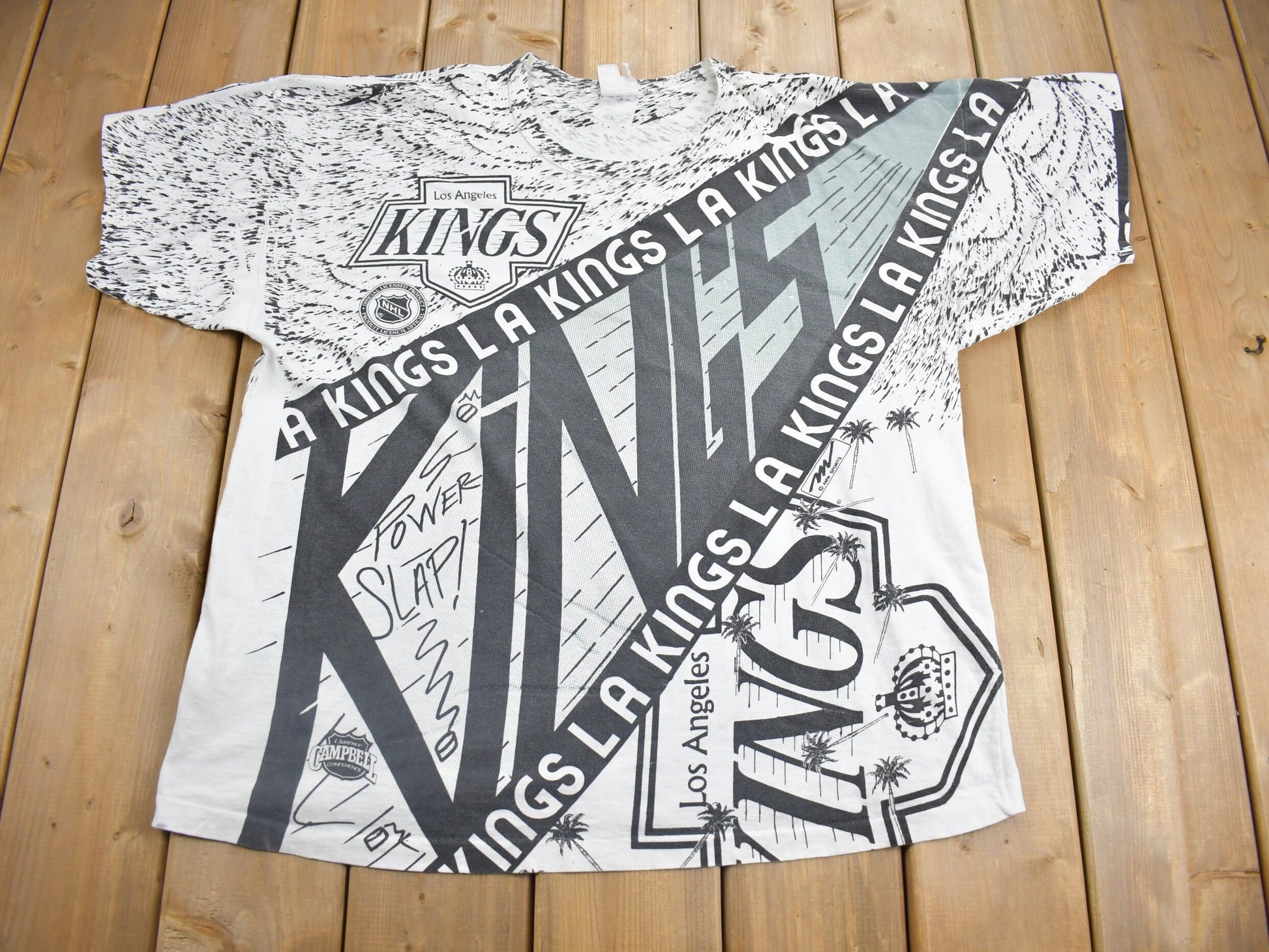 Vintage 1990s Los Angeles Kings NHL All Over Print Graphic T-Shirt
