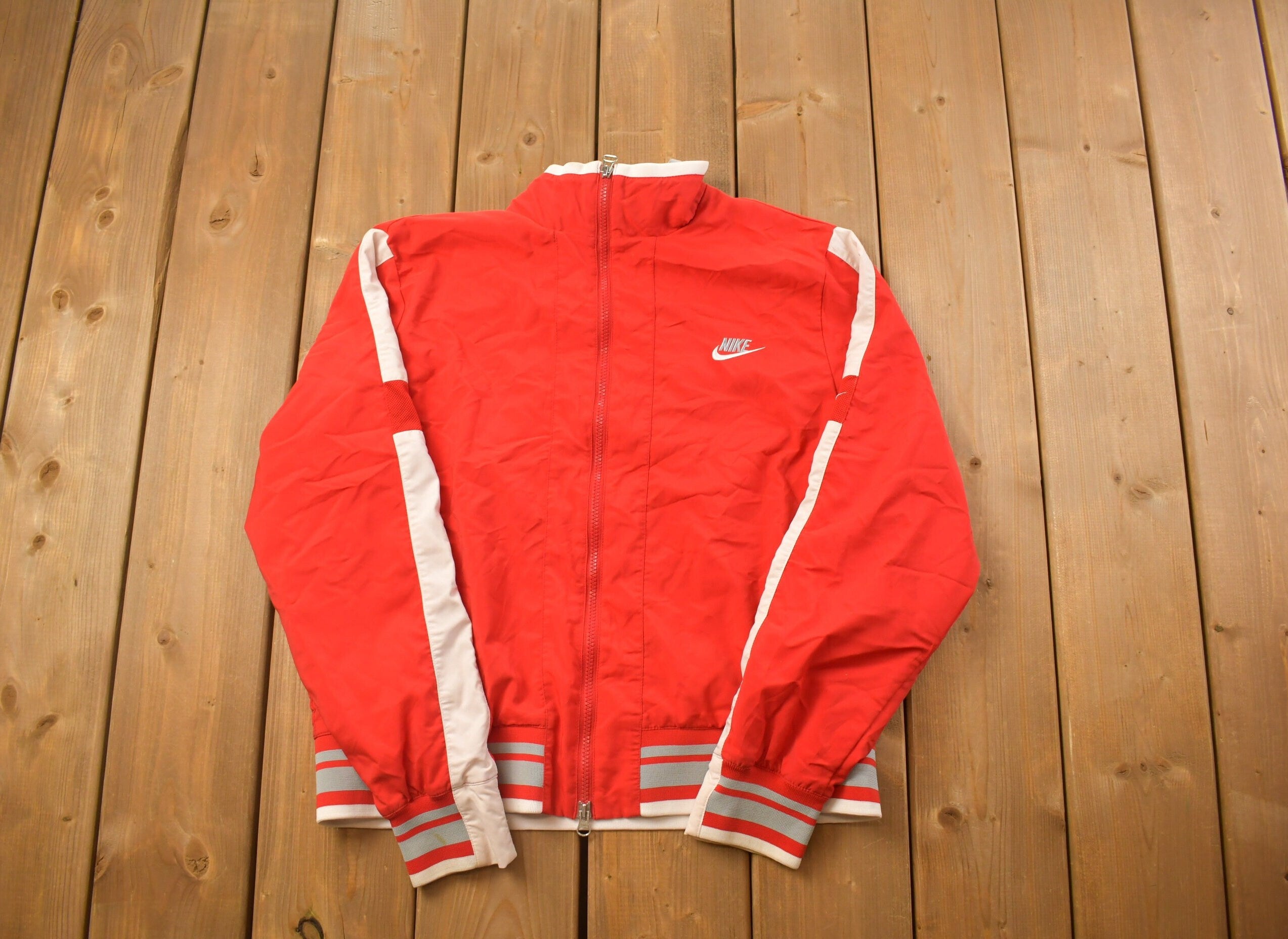 Vintage 1990s Nike Embroidered Mini Swoosh Zip-Up Jacket