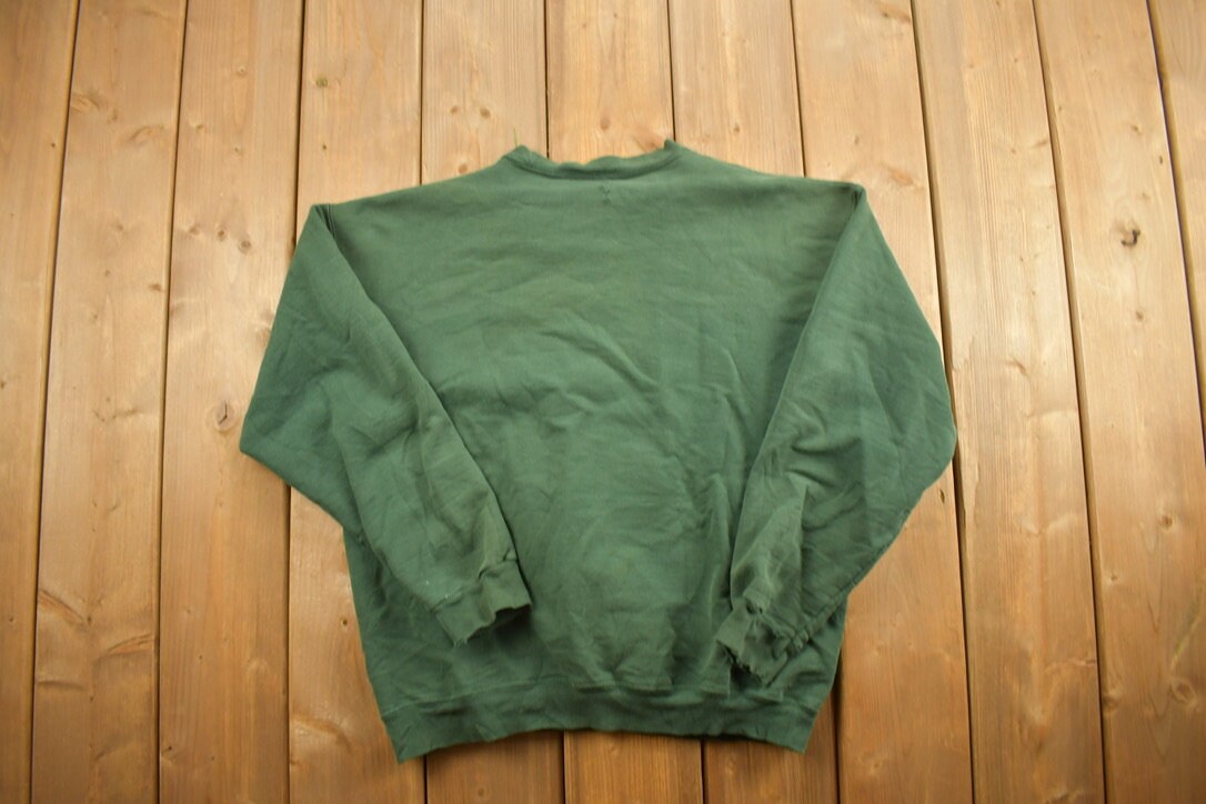 Vintage 1990s Thrashed Blank Green Crewneck Sweatshirt