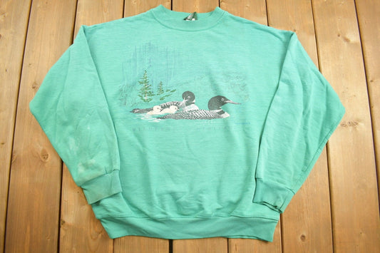 Vintage 1990s Northern Reflections Canadian Goose Graphic Wilderness Heritage Crewneck / Vintage Sweatshirt / Outdoorsman / Wilderness /