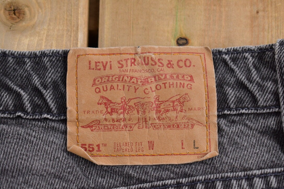 Vintage 1990s Levi's 551 Red Tab Jeans Size 32 x 31.5 / 90s Levis / Black Wash Denim / Streetwear Fashion / Made In USA