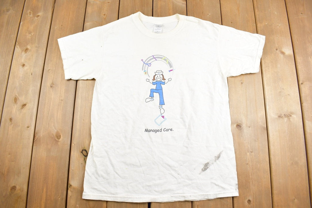 Vintage 1990s Nurse Mates Managed Care Graphic T-Shirt