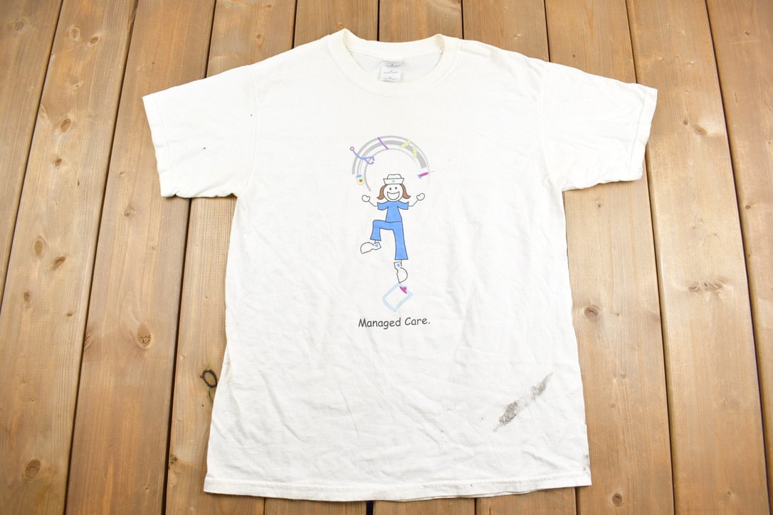 Vintage 1990s Nurse Mates Managed Care Graphic T-Shirt