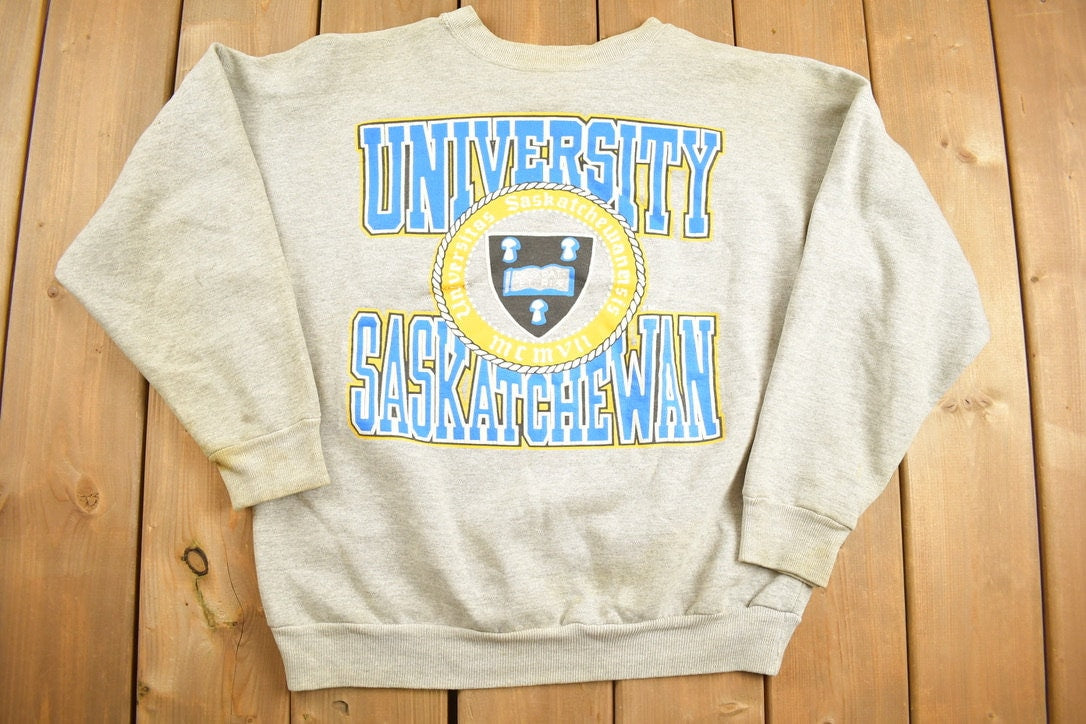 Vintage 1990s University Of Saskatchewan Collegiate Crewneck / Embroidered / NCAA Sweatshirt / Sportswear / Americana / Deo Et Patriae