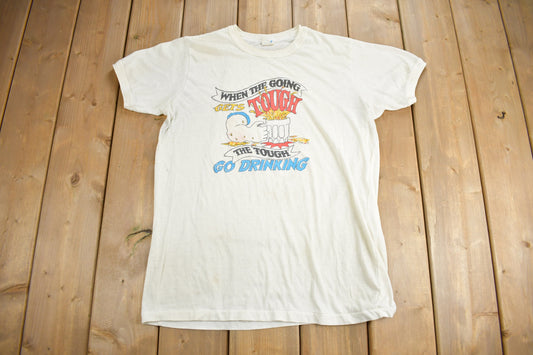 Vintage 1980s "When The Going Gets Tough the Tough Go Drinking" Graphic T Shirt / Drinking Tee / Single Stitch / Made In Canada