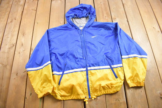 Vintage 1990s Reebok Embroidered Windbreaker Jacket / Color Block / Windbreaker / 1980s Jacket / Blue Jacket