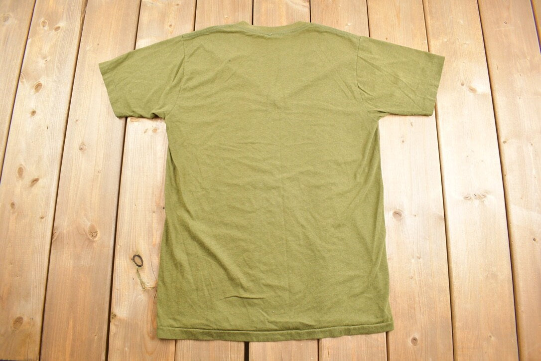 Vintage 1970s K OSS Commando Camp Quebec Graphic T-Shirt / Streetwear / Single Stitch / Portage Du Fort Military / 70s Graphic V Neck Tee