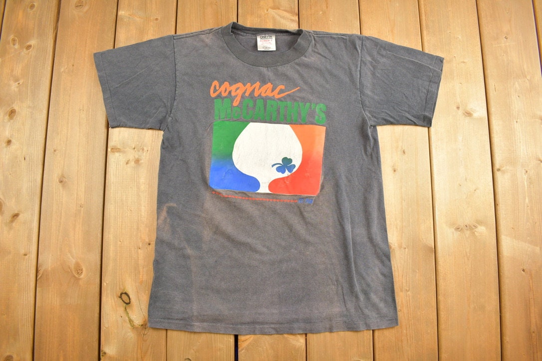 Vintage 1980s Cognac McCarthys Graphic T-Shirt / Streetwear / Retro Style / Single Stitch / Made In USA / 80s Graphic Tee / ONEITA