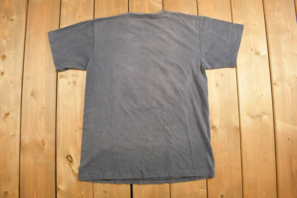 Vintage 1980s Cognac McCarthys Graphic T-Shirt