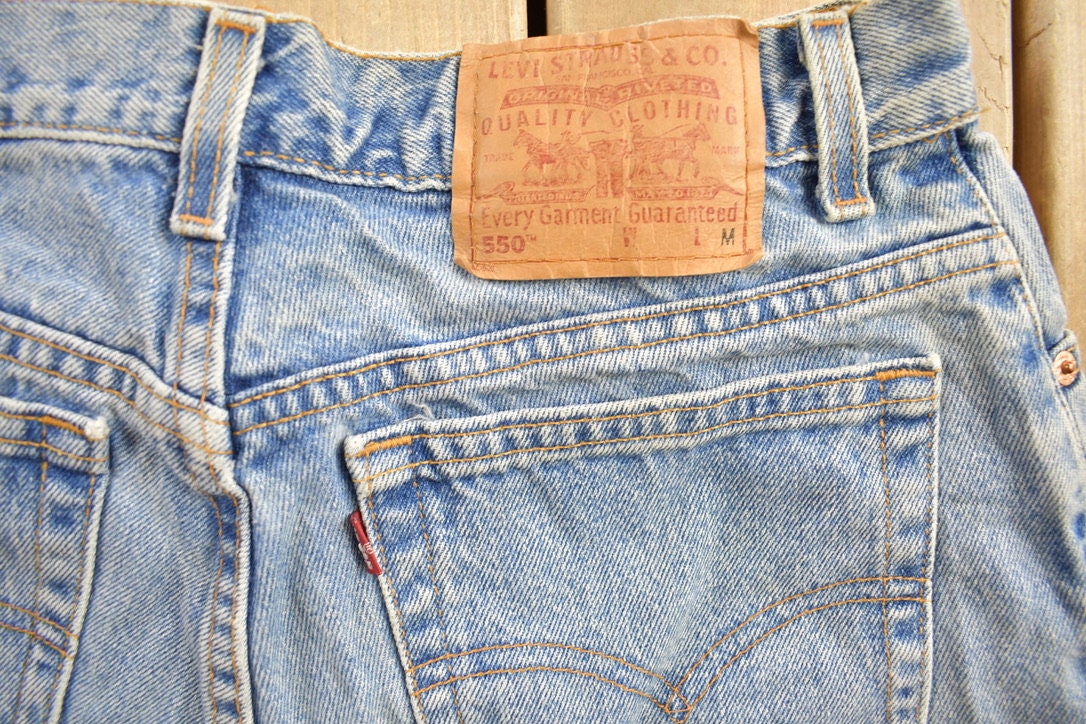 Vintage 1990s Levi's 550 Red Tab Jeans Size 30 x 29