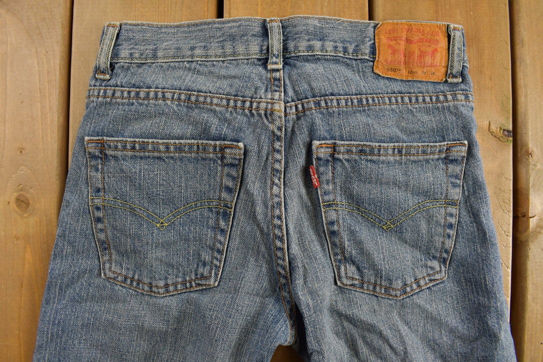 Vintage 1990s Levi's 550 Youth Jeans Size 26 x 26 / Blue / Mid Wash / Vintage Denim  / Red Tab / Straight Cut