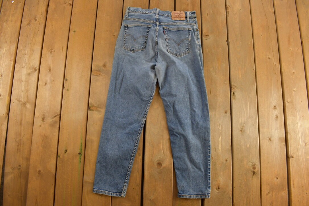 Vintage 1990s Levi's 550 Red Tab Denim Jeans Size  30 x 26 / Medium Wash / Vintage Denim / Streetwear / Jeans / Relaxed