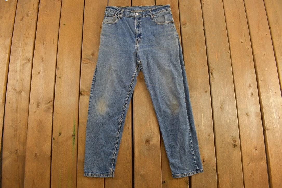 Vintage 1990s Levi's 550 Red Tab Denim Jeans Size  30 x 26 / Medium Wash / Vintage Denim / Streetwear / Jeans / Relaxed