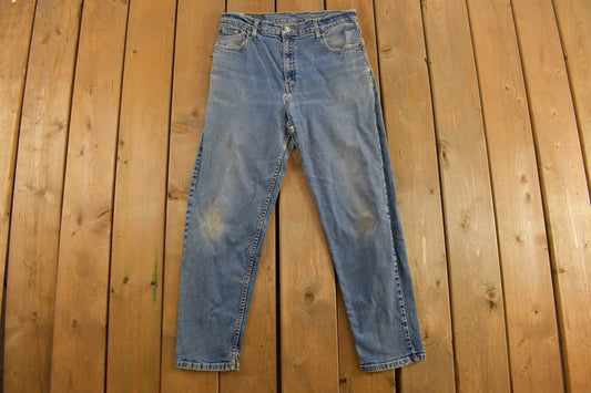 Vintage 1990s Levi's 550 Red Tab Denim Jeans Size  30 x 26 / Medium Wash / Vintage Denim / Streetwear / Jeans / Relaxed