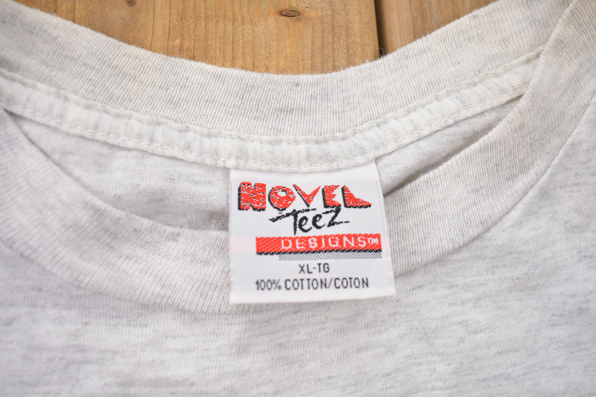 Vintage 1990s  Looney Tunes Hockey Graphic T-Shirt