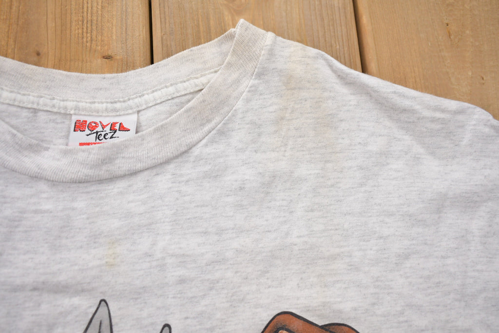 Vintage 1990s  Looney Tunes Hockey Graphic T-Shirt