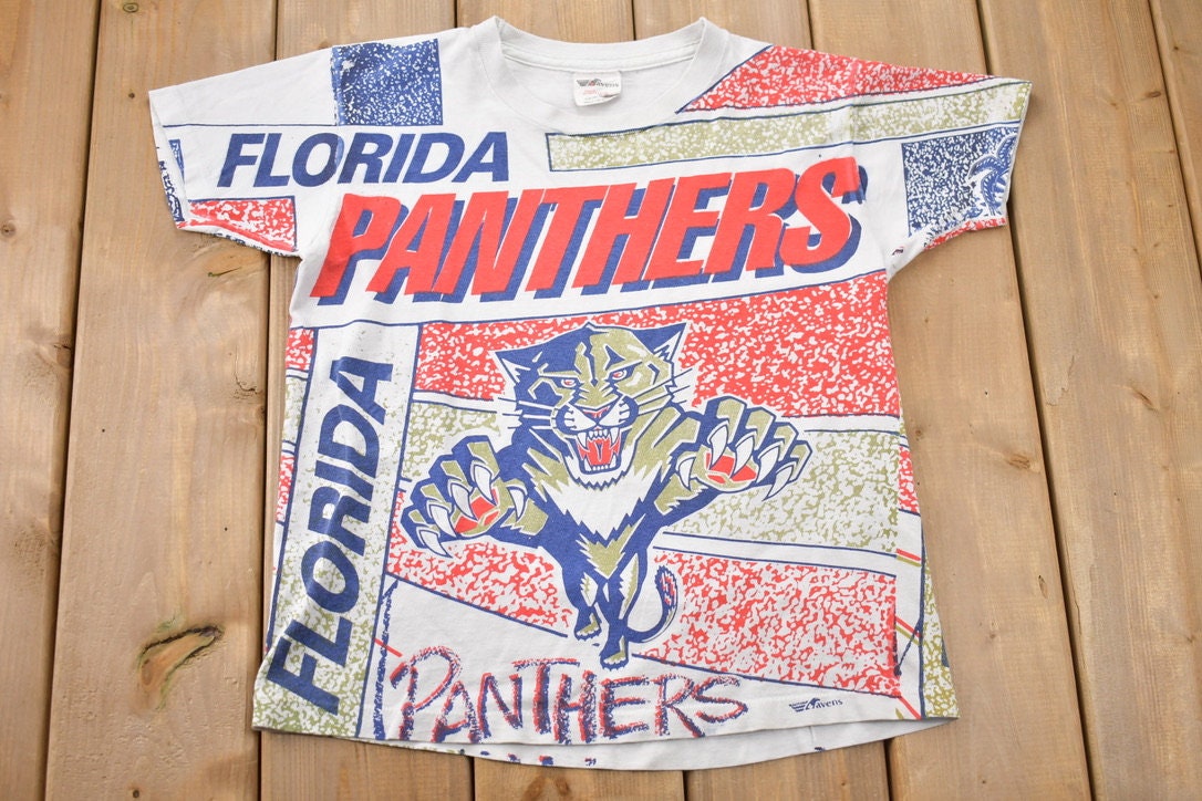 Vintage 1990s Florida Panthers All Over Print NHL Graphic Kids T-Shirt Made In Canada
