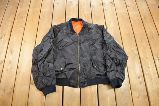 Vintage 1990s Black Satin Bomber Jacket / Zip Up / Streetwear / Souvenir Jacket / Made In USA / Streetwear / Orange Lined