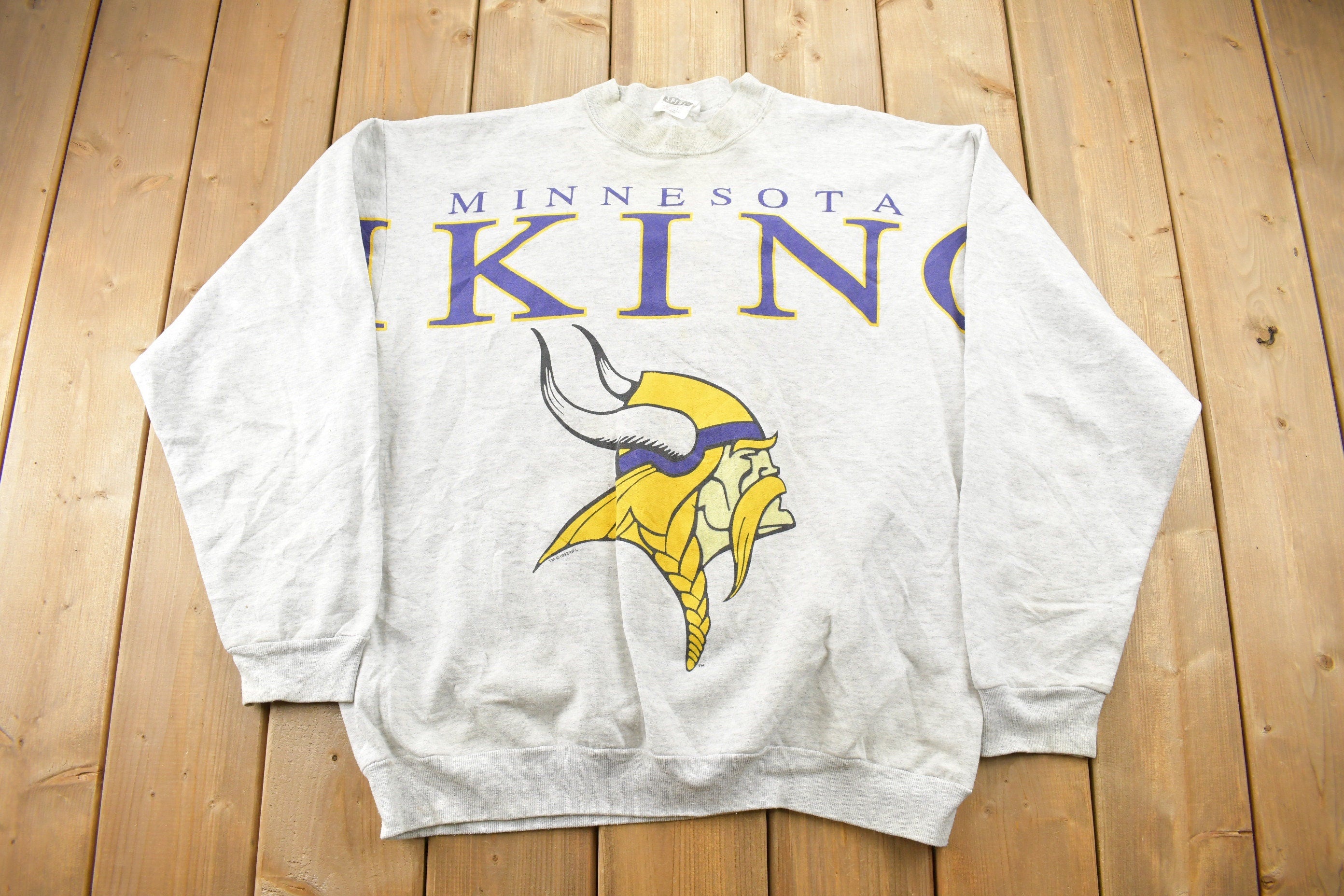 Vintage 1990s Minnesota Vikings NFL Big Spell Out Crewneck Sweatshirt –  LOST BOYS VINTAGE