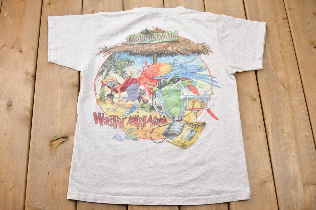 Vintage 1996 Jimmy Buffets Wastin Away Again T-Shirt / 90s / Streetwear / Tropics Shirt / Vacation Tee / Travel & Tourism / Parrot