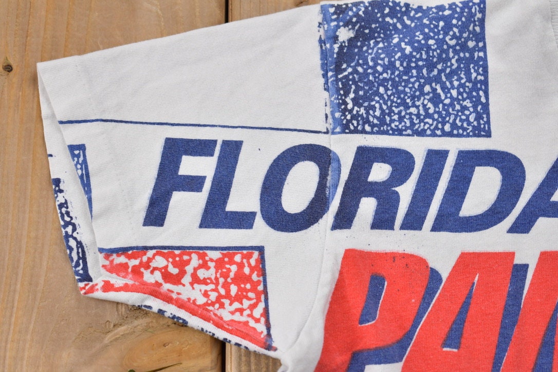 Vintage 1990s Florida Panthers All Over Print NHL Graphic Kids T-Shirt Made In Canada