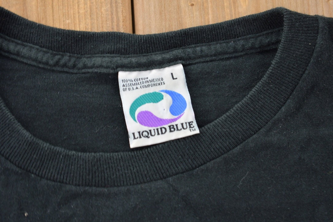 Vintage 1990s Dallas Cowboys Liquid Blue Graphic T-Shirt