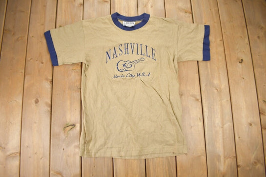 Vintage 1990s Nashville Music City Souvenir T Shirt / Times Square Sportswear / Made In USA / Vacation Tee / Single Stitch / Embroidered