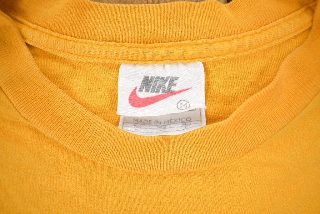 Vintage 1990s Nike Mini Swoosh Graphic T-Shirt