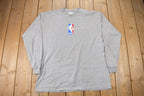 Vintage 1990s NBA Logo Graphic Long Sleeve T-Shirt Made In USA