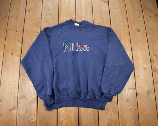 Vintage 1990s Nike Embroidered Mini Swoosh Crewneck Sweatshirt / Vintage Nike / Sportswear / Streetwear / Athleisure / Blue Crewneck