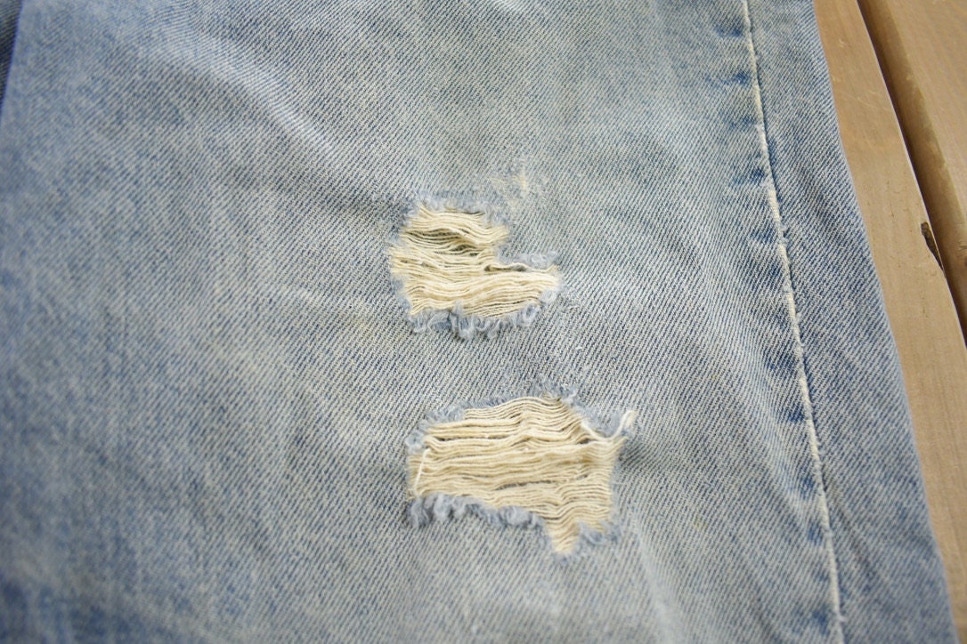 Vintage 1990s Levi's Jeans Size 30x27 / Vintage Denim / Streetwear / Made In USA / Vintage Levi's / Distressed