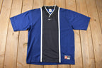 Vintage 1990s Nike Middle Swoosh Blue Jersey Style T Shirt Size S