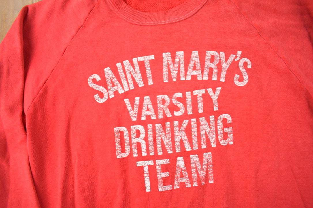 Vintage 1960s Saint Mary's Varsity Drinking Team Raglan Sweatshirt