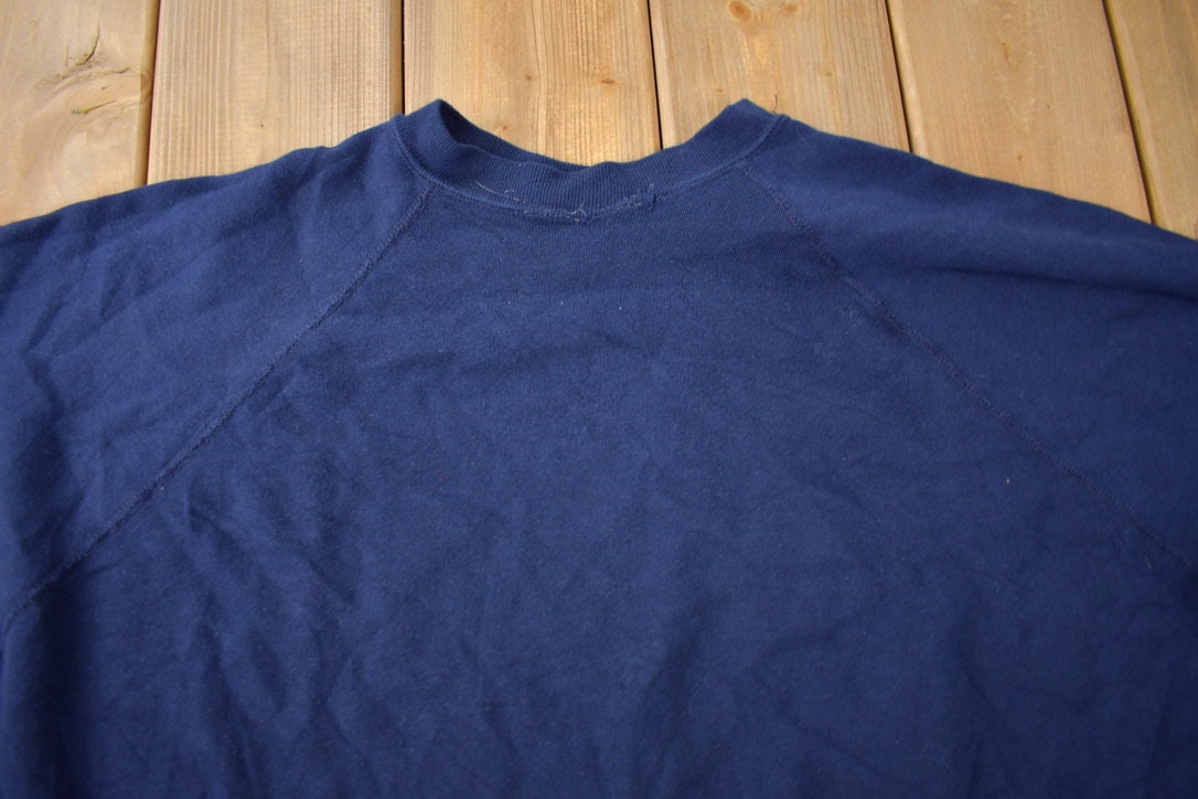 Vintage 1980s Navy Blue Blank Raglan Crewneck Sweatshirt Made In USA