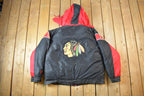 Vintage 1990s Chicago Blackhawks Reversible NHL Hockey Puffer Hooded Jacket