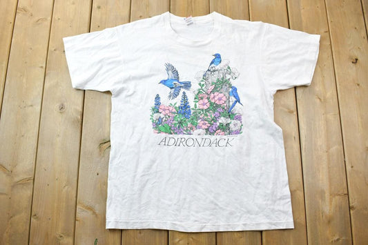 Vintage 1990s Adirondack Floral Multi Blue Bird Theme Graphic T-Shirt