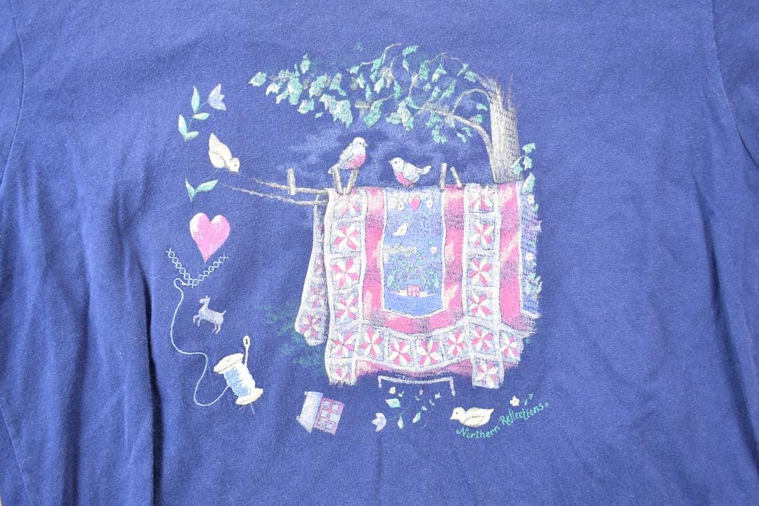 Vintage 1990s Northern Reflections Bird And Blanket Theme Graphic T-Shirt