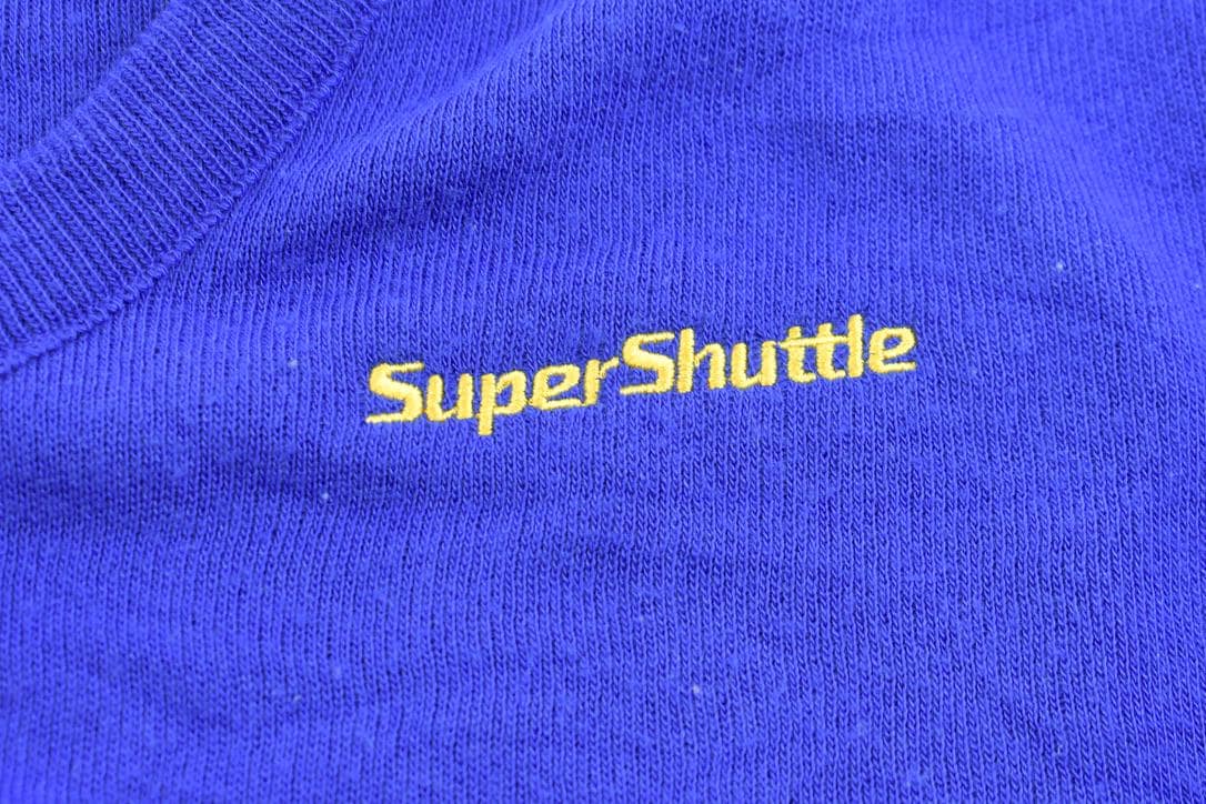 Vintage 1990s Super Shuttle Andrew Rohan Knitted V-Neck Sweater