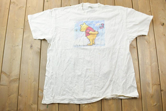 Vintage 1990s Winnie The Pooh Bear Holding Flowers Disney Cartoon Promo T-Shirt