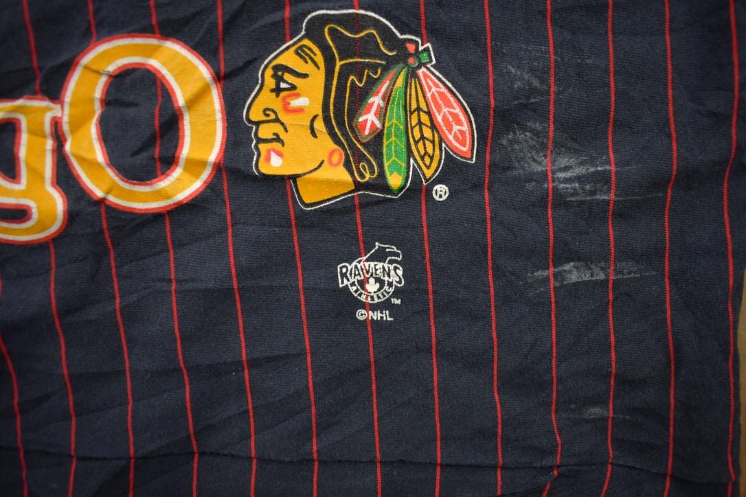 Vintage 1990s Chicago Blackhawks NHL All Over Print Graphic T-Shirt