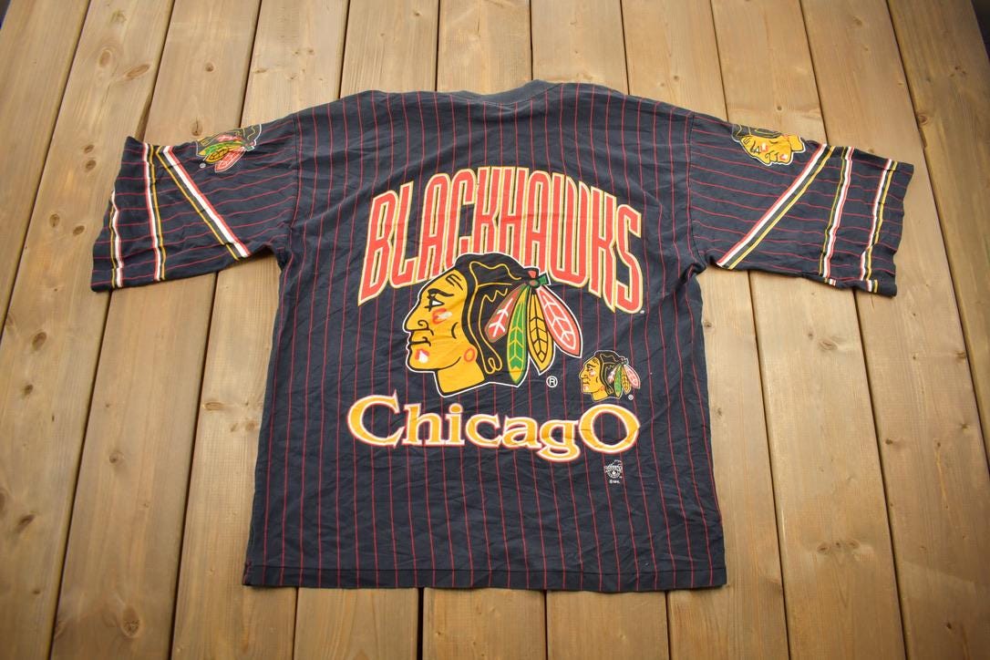 Vintage 1990s Chicago Blackhawks NHL All Over Print Graphic T-Shirt