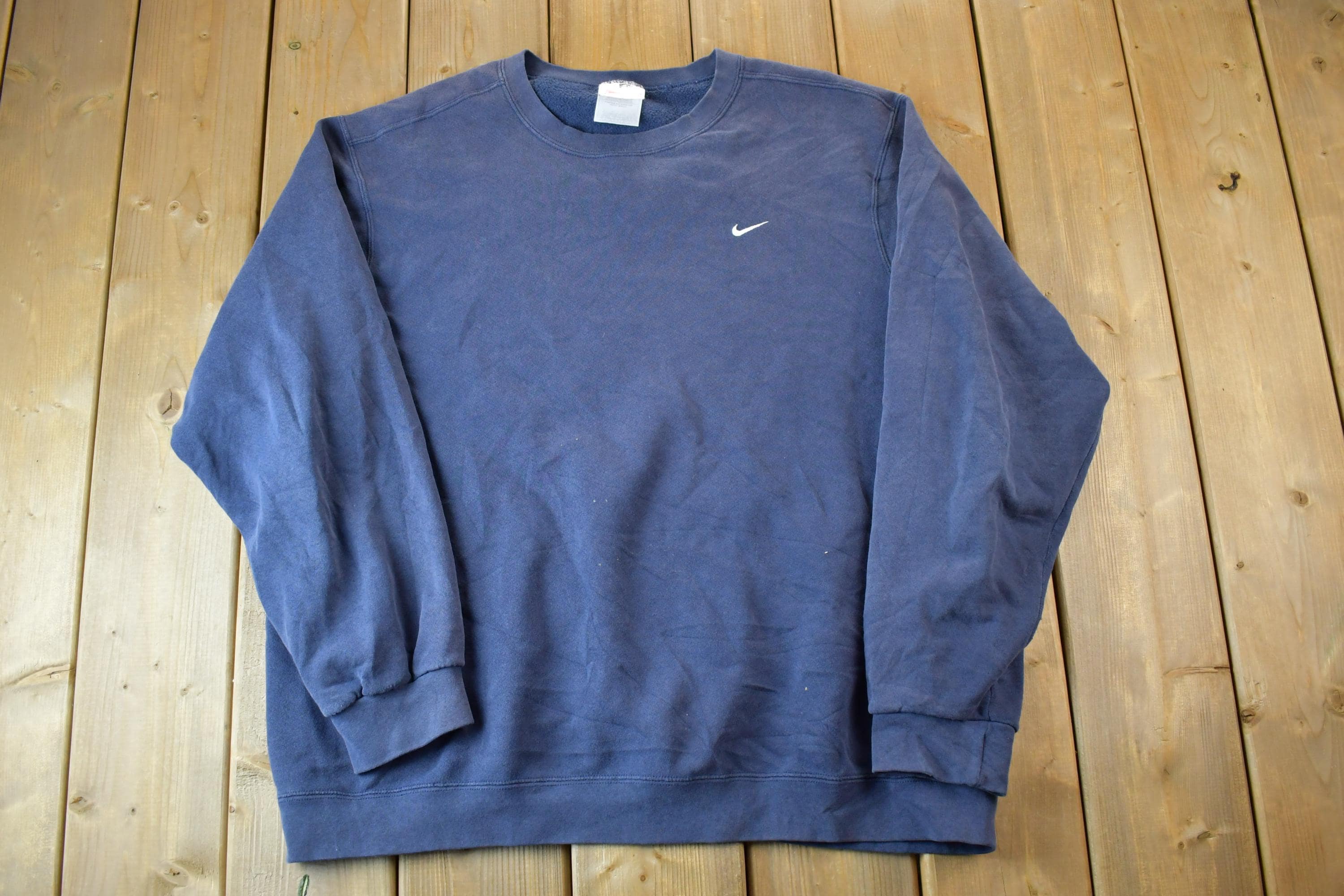 Vintage 1990s Nike Embroidered Mini Swoosh Navy Crewneck Sweatshirt